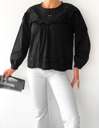 A model wears 16579 - Blouse - Black, wholesale Blouse of Sobe to display at Lonca