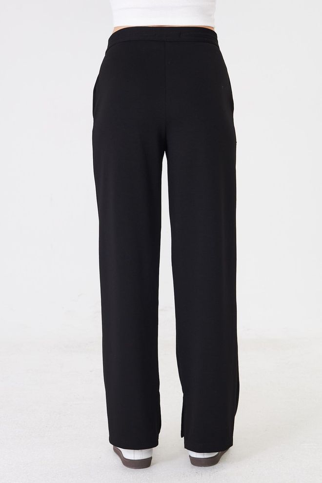 Sortie Collection Black Sweatpants With Wide Leg And Buttoned Closure Wholesale Clothing 1