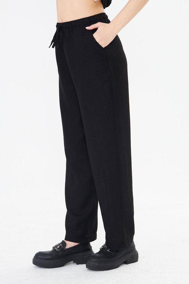 Sortie Collection Black Tapered Carrot Pants With Drawstring Closure Wholesale Clothing Lounge