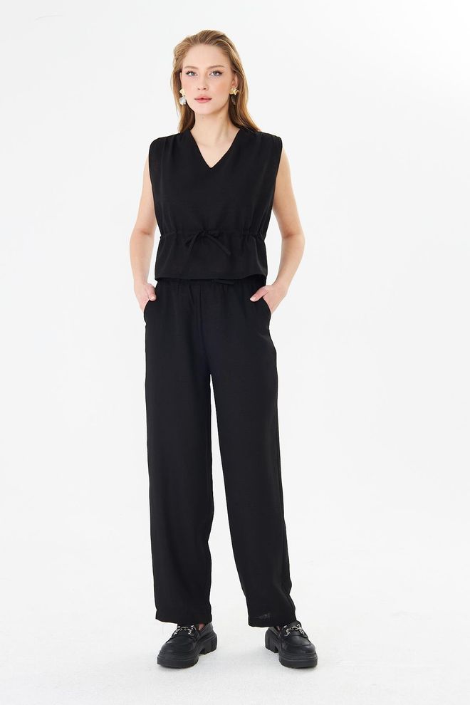 Sortie Collection Black Tapered Carrot Pants With Drawstring Closure Wholesale Clothing Summer