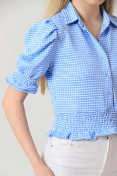 A wholesale clothing model wears top10270-shirt-with-sleeve-hem-skirt-blue, Turkish wholesale Shirt of Topshow
