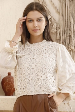 A wholesale clothing model wears top10419-lace-front-evening-dress-blouse-stone, Turkish wholesale Blouse of Topshow