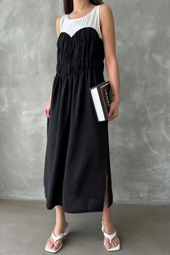 Модель оптовой продажи одежды носит top10804-black-dress, турецкий оптовый товар Одеваться от Topshow.