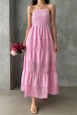 Bir model,  toptan giyim markasının top10822-strappy-chest-gimped-length-dress-dark-pink toptan  ürününü sergiliyor.