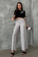 Una modelo de ropa al por mayor lleva top11068-gray-linen-trousers,  turco al por mayor de 