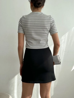 A wholesale clothing model wears top11121-black-striped-skirt-with-ruched-striped-blouse, Turkish wholesale Blouse of Topshow