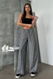 A wholesale clothing model wears top11140-black-d-2634-striped-linen-trousers, Turkish wholesale  of 
