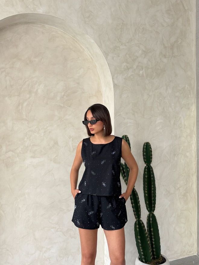 Topshow Pantaloncini Con Stampa Bow Stone Neri | Abbigliamento all'ingrosso Da spiaggia