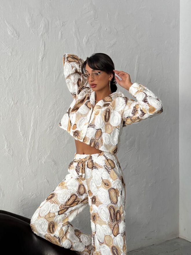 Topshow قميص بيج رخامي كاجوال بأزرار بياقة شال ملابس بالجملة صالة