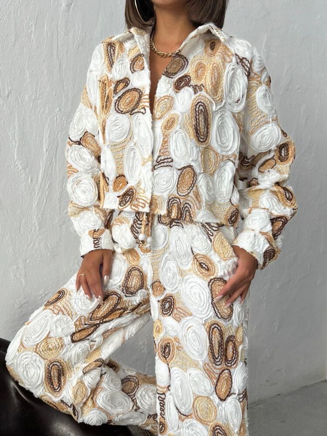 Topshow قميص بيج رخامي كاجوال بأزرار بياقة شال ملابس بالجملة ربيع