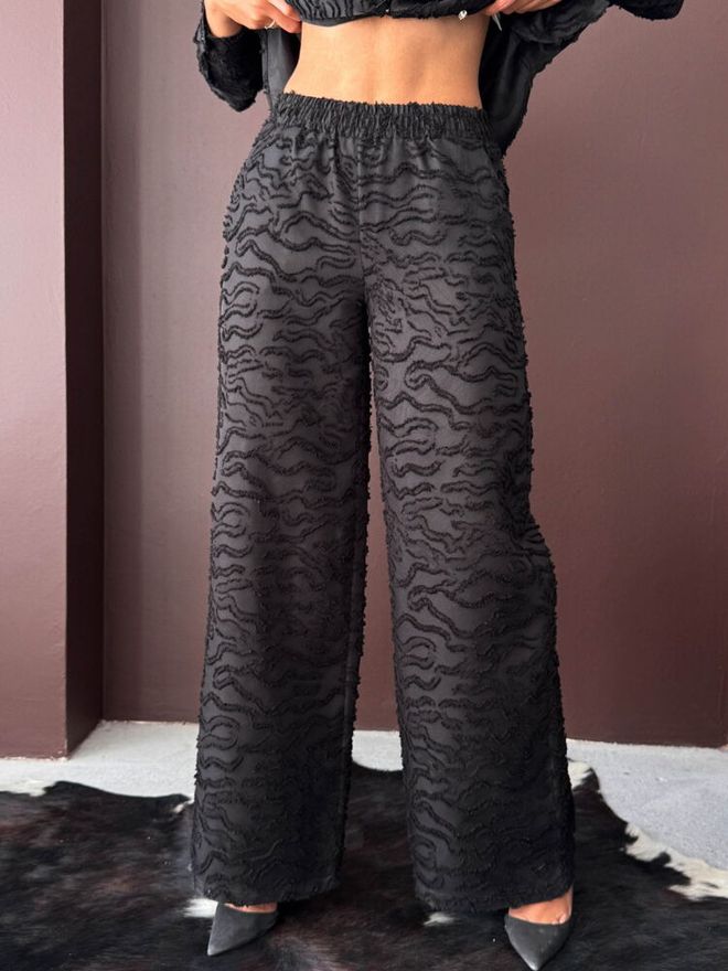 Topshow بنطال بالازو أسود أنيق بريق كاجوال ملابس بالجملة 1