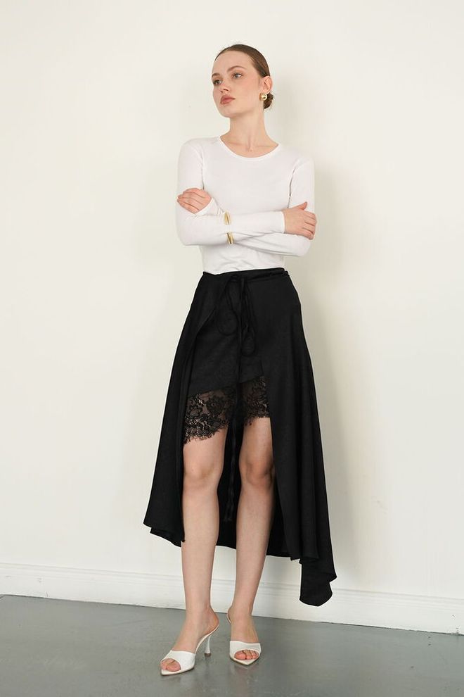 Topshow جيبة سوداء أنيقة غير متماثلة ميدي ملابس بالجملة جنسي