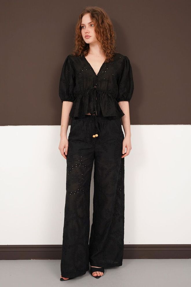 Topshow بنطال بالازو أسود بخصر متوسط ورباط ملابس بالجملة غير رسمي