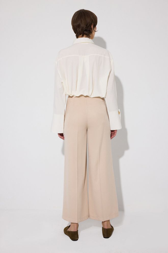 Touche Prive Beżowe Eleganckie Spodnie Palazzo Z Szerokimi Nogawkami Hurtowa sprzedaż odzieży 1