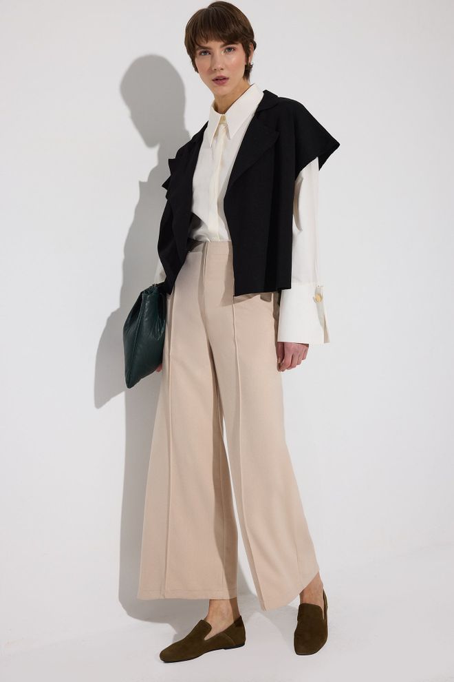 Touche Prive Beżowe Eleganckie Spodnie Palazzo Z Szerokimi Nogawkami Hurtowa sprzedaż odzieży Odpoczynek