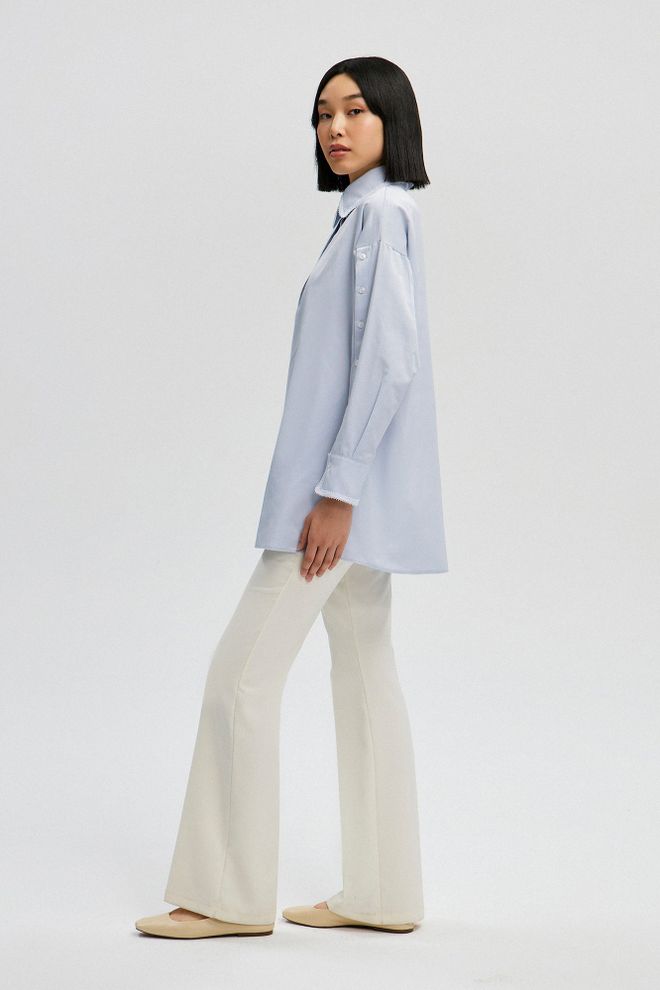 Touche Prive Niebieska Tunika Z Kołnierzykiem Polo I Zapinana Na Guziki Hurtowa sprzedaż odzieży Skromny