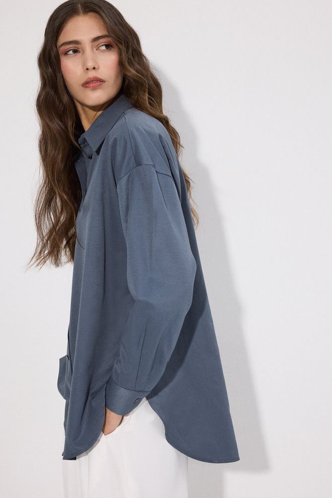 Touche Prive Blauw Oversized Polohals Shirt Met Knopen Groothandel Kleding Casual