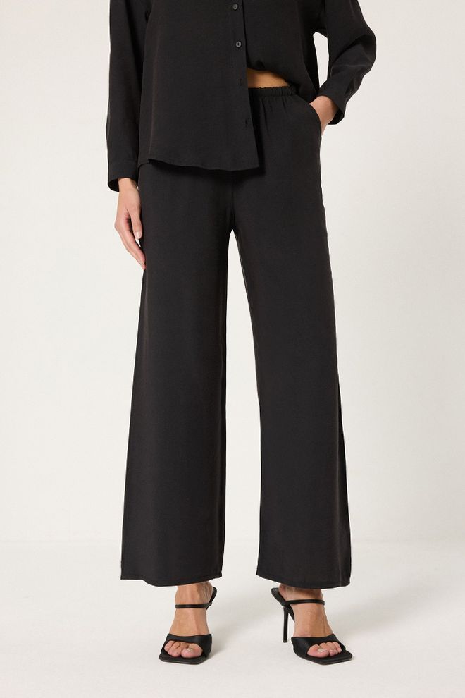 Touche Prive Conjunto Negro Elegante Con Pantalones Palazzo Y Falda Asimétrica Ropa al por mayor Casual