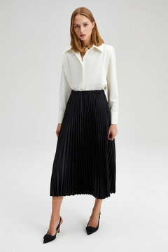 A wholesale clothing model wears TOU10006 - Pleated Satin Skirt, Turkish wholesale Skirt of Touche Prive
