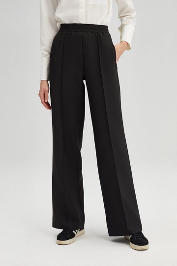 A wholesale clothing model wears  Ribbed Crepe Trousers - Black
, Turkish wholesale Pants of Touche Prive