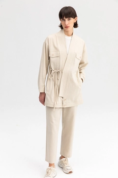 A wholesale clothing model wears TOU10379 - Rib Belted Linen Jacket - Beige, Turkish wholesale Jacket of Touche Prive