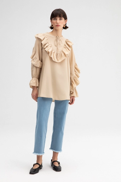 A model wears TOU11004 - Frilled Poplin Tunic - Beige, wholesale Tunic of Touche Prive to display at Lonca
