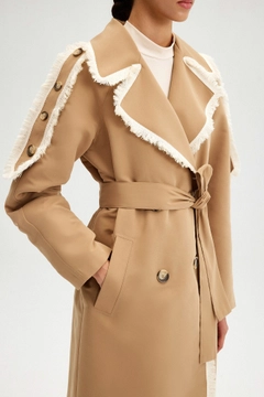 A wholesale clothing model wears tou12351-double-breasted-trenchcoat-with-fringe-detail-beige, Turkish wholesale Trenchcoat of Touche Prive
