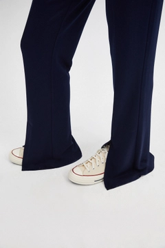 Una modella di abbigliamento all'ingrosso indossa 45811 - STEEL TROUSERS WITH SPLIT, vendita all'ingrosso turca di Pantaloni di Touche Prive