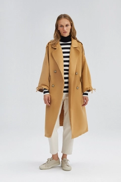 A wholesale clothing model wears 33915 - Double Breasted Trenchcoat With Armlaced, Turkish wholesale Trenchcoat of Touche Prive