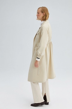 A wholesale clothing model wears 34011 - Elastic Waisted Trenchcoat, Turkish wholesale Trenchcoat of Touche Prive