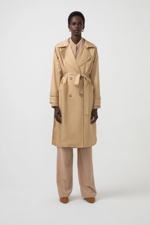 A model wears 34165 - Double Breasted Relaxed Trench Coat, wholesale undefined of Touche Prive to display at Lonca