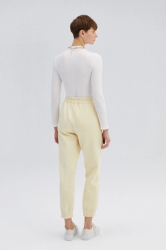 A wholesale clothing model wears 34725 - Scuba Jogger Trousers, Turkish wholesale Pants of Touche Prive