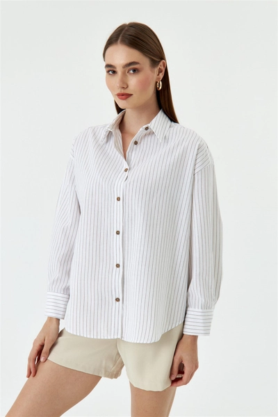A model wears TBU10839 - Women's Pinstripe Long Sleeve Shirt - White/Beige, wholesale Shirt of Tuba Butik to display at Lonca