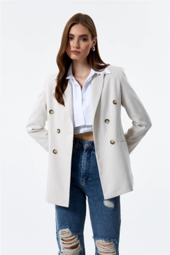 Bir model, Tuba Butik toptan giyim markasının TBU10071 - Jacket - Stone Color toptan Ceket ürününü sergiliyor.