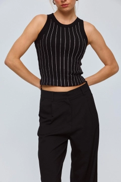 A wholesale clothing model wears tbu12713-halter-neck-stone-printed-women's-undershirt-black, Turkish wholesale Undershirt of Tuba Butik