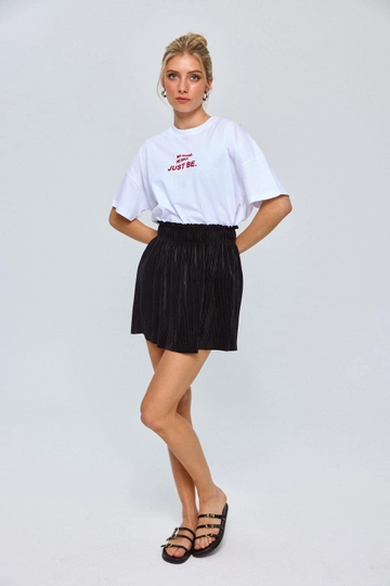 A wholesale clothing model wears  Pleated Mini Skirt - Black
, Turkish wholesale  of Tuba Butik