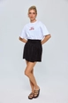 A wholesale clothing model wears tbu12718-pleated-mini-skirt-black, Turkish wholesale  of 