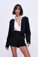 A wholesale clothing model wears tbu11937-women's-high-waist-bermuda-shorts-black, Turkish wholesale  of 
