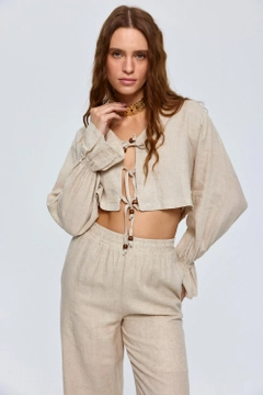 Ένα μοντέλο χονδρικής πώλησης ρούχων φοράει tbu12613-bohemian-blouse-trousers-linen-women's-suit-beige, τούρκικο Ταγέρ χονδρικής πώλησης από Tuba Butik
