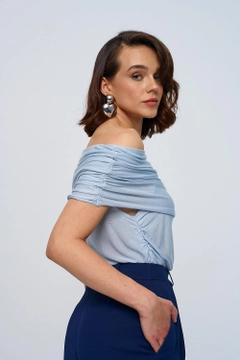 A wholesale clothing model wears tbu12789-madonna-collar-gathered-knitwear-women's-blouse-blue, Turkish wholesale Blouse of Tuba Butik