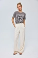 A wholesale clothing model wears tbu12792-darted-palazzo-women's-trousers-cream, Turkish wholesale  of 