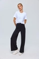 A wholesale clothing model wears tbu12798-modal-wide-leg-women's-trousers-black, Turkish wholesale  of 