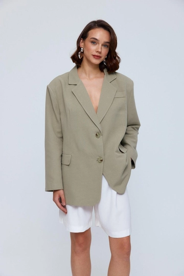Модель оптовой продажи одежды носит  Льняная Женская Куртка Оверсайз - Хаки
, турецкий оптовый товар Куртка от Tuba Butik.
