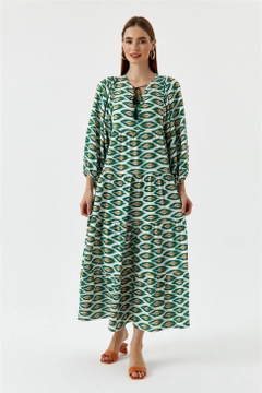 A wholesale clothing model wears TBU10581 - Balloon Sleeve Pattern Dress - Green, Turkish wholesale Dress of Tuba Butik