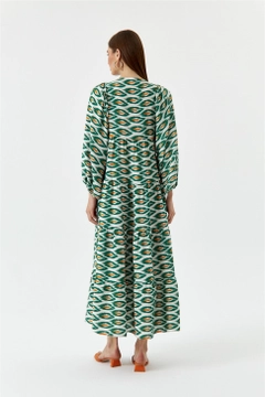 A wholesale clothing model wears TBU10581 - Balloon Sleeve Pattern Dress - Green, Turkish wholesale Dress of Tuba Butik
