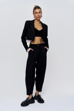A wholesale clothing model wears tbu11834-pleated-shalwar-women's-trousers-black, Turkish wholesale Pants of Tuba Butik