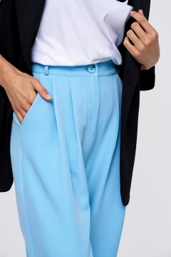 A wholesale clothing model wears tbu11894-pleated-shalwar-women's-trousers-blue, Turkish wholesale Pants of Tuba Butik