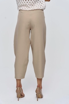 A wholesale clothing model wears tbu11974-pleated-shalwar-women's-trousers-mink, Turkish wholesale Pants of Tuba Butik