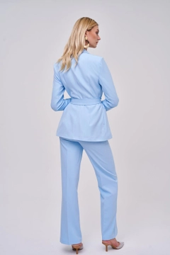 A wholesale clothing model wears tbu12588-belted-blazer-jacket-trousers-baby-women's-suit-blue, Turkish wholesale Suit of Tuba Butik