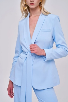 A wholesale clothing model wears tbu12588-belted-blazer-jacket-trousers-baby-women's-suit-blue, Turkish wholesale Suit of Tuba Butik